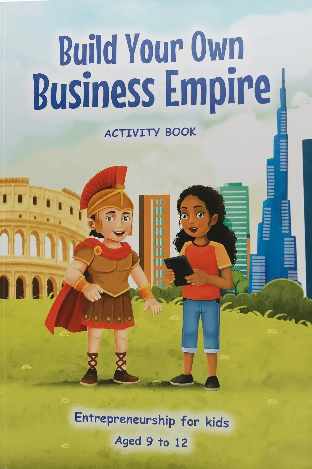 Book cover of 'Build Your Own Business Empire' activity book with two children in front of a cityscape.